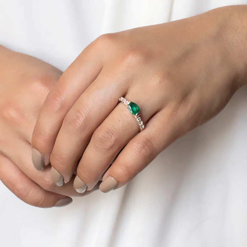 Emerald and White Topaz Ring